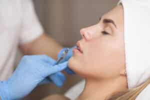 A woman getting a JUVÉDERM® injection in Leon Valley